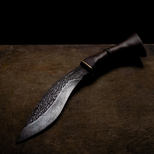 vecteezy_a-knife-with-an-iron-engraving_11029706